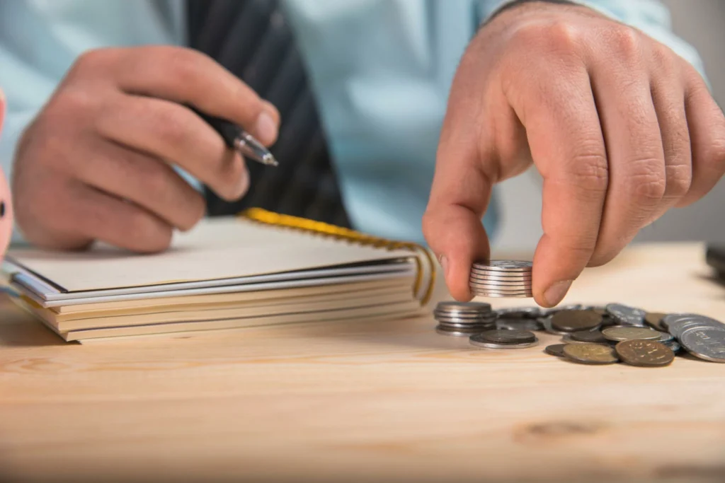 Financial planning desk with calculator, documents, and money showing CD investment decisions for better returns on FlashyTools.